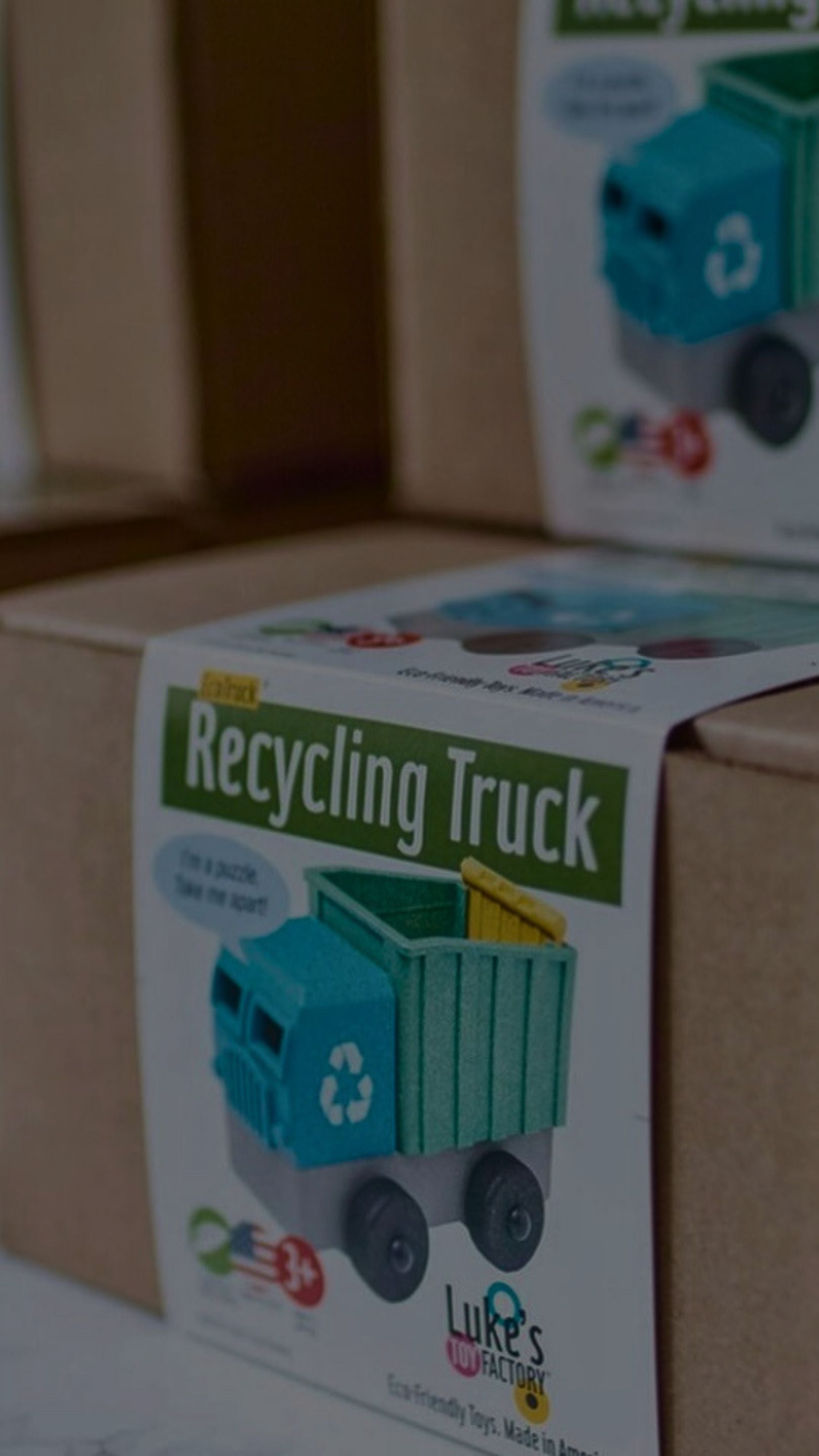 A packaged Luke's Toy Factory Recycling Truck on a store shelf