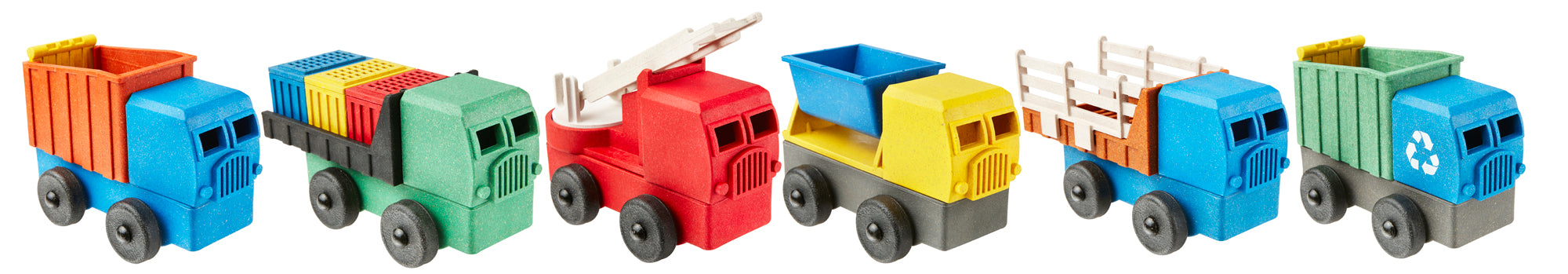 Toy Trucks for preschoolers in a line. Made by Luke's Toy Factory