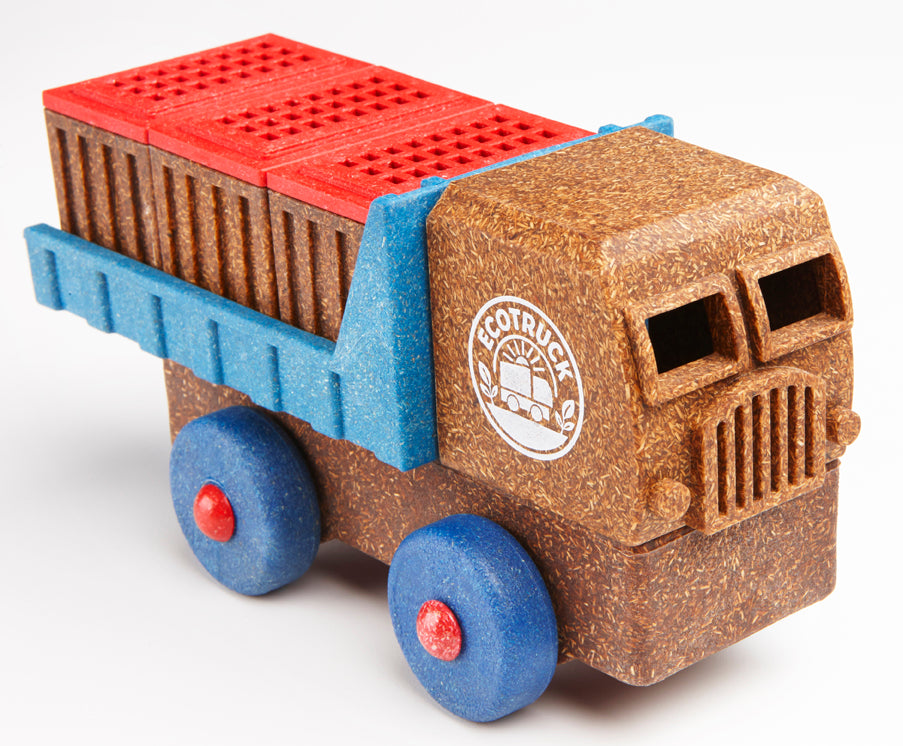 Wooden toy truck with blue cargo bed and red boxes. Preschool toy