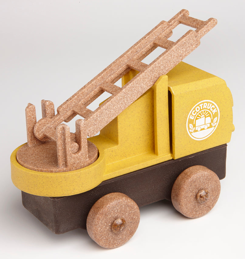 Educational toy fire truck with a ladder on a white background