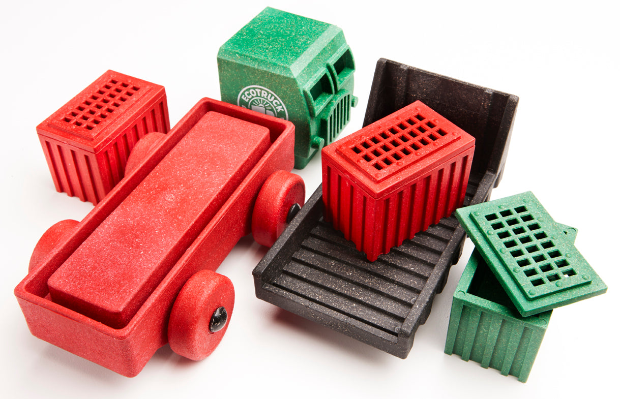 Toy truck for preschoolers in green and red coloring. 