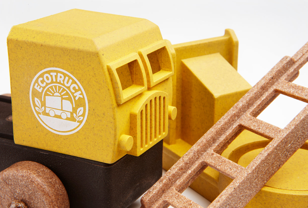 Yellow toy fire truck with 'ECOTRUCK' logo on a white background
