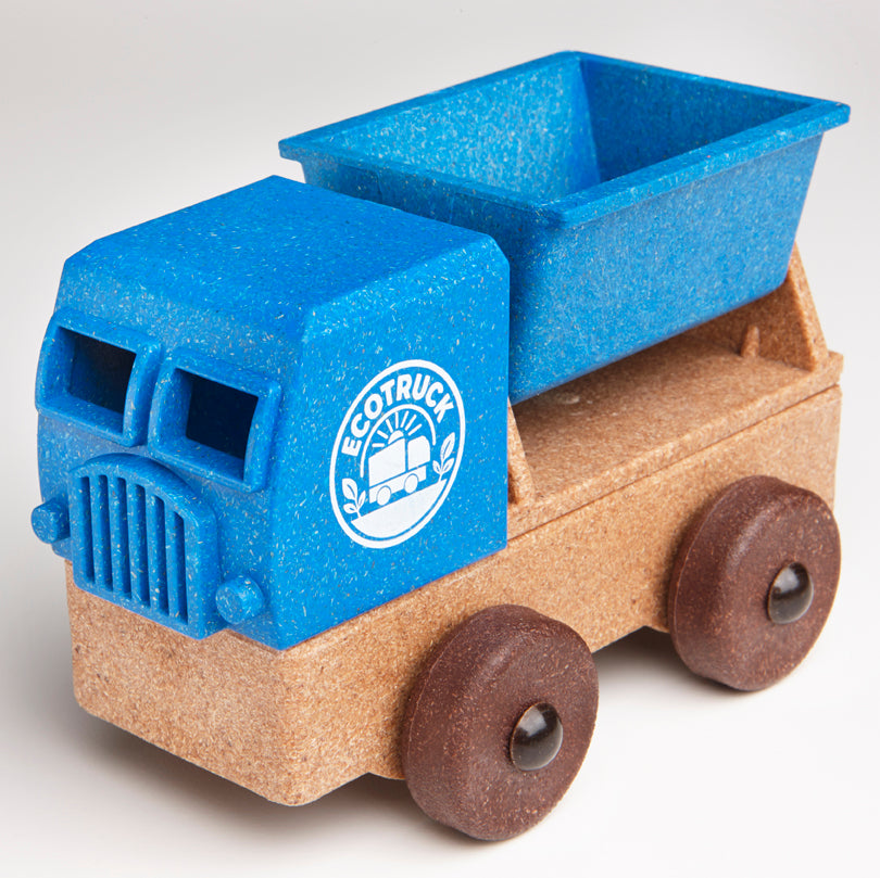 Toy truck with blue cab and blue tipper body, with brown chasis featuring the 'EcoTruck' logo.