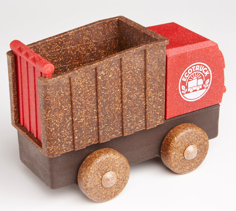 Wooden toy truck with red and brown design on a white background