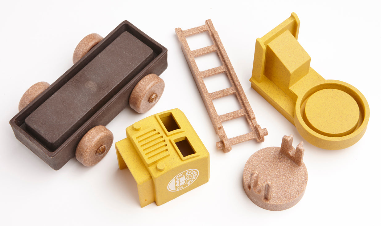 3D puzzle parts of educational fire truck toy and accessories on a white background